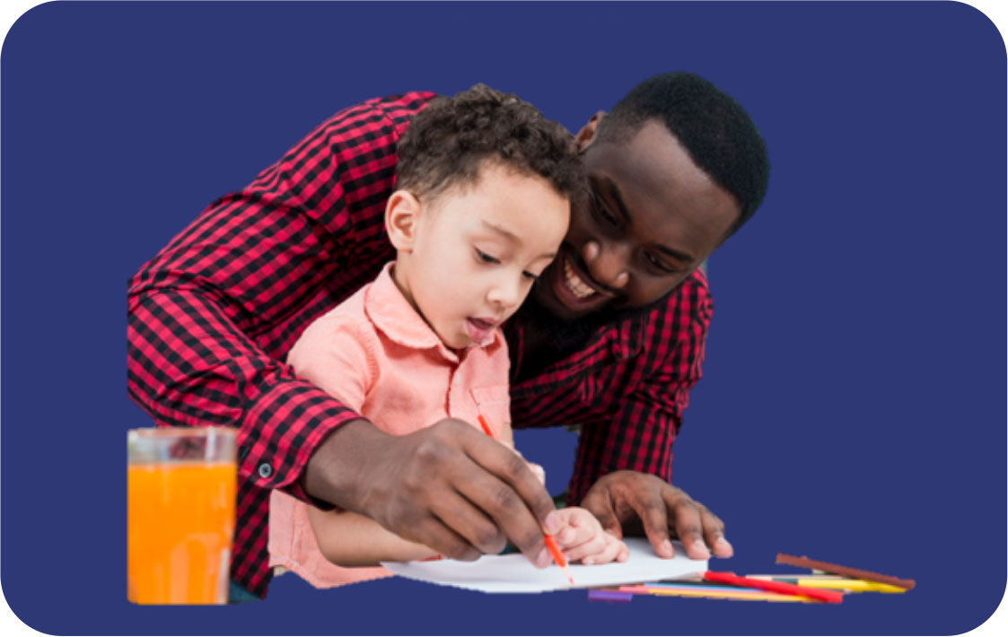 man helping boy with school work