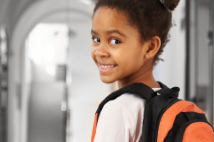 young girl with backpack