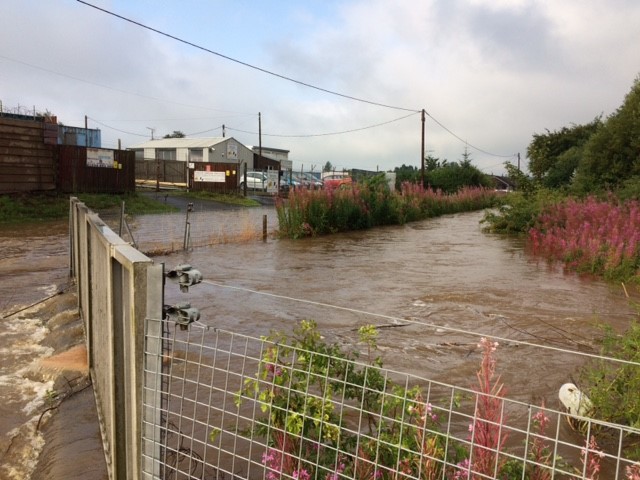 picture of overflowing river - Fife Council supporting communities as more flood warnings in place