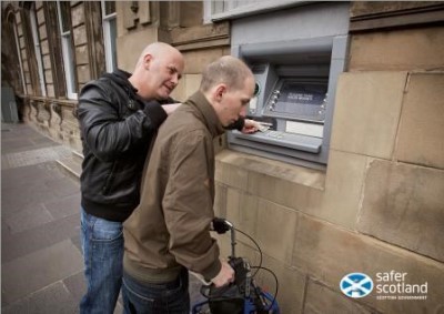 Adult forced to withdraw money from cash machine
