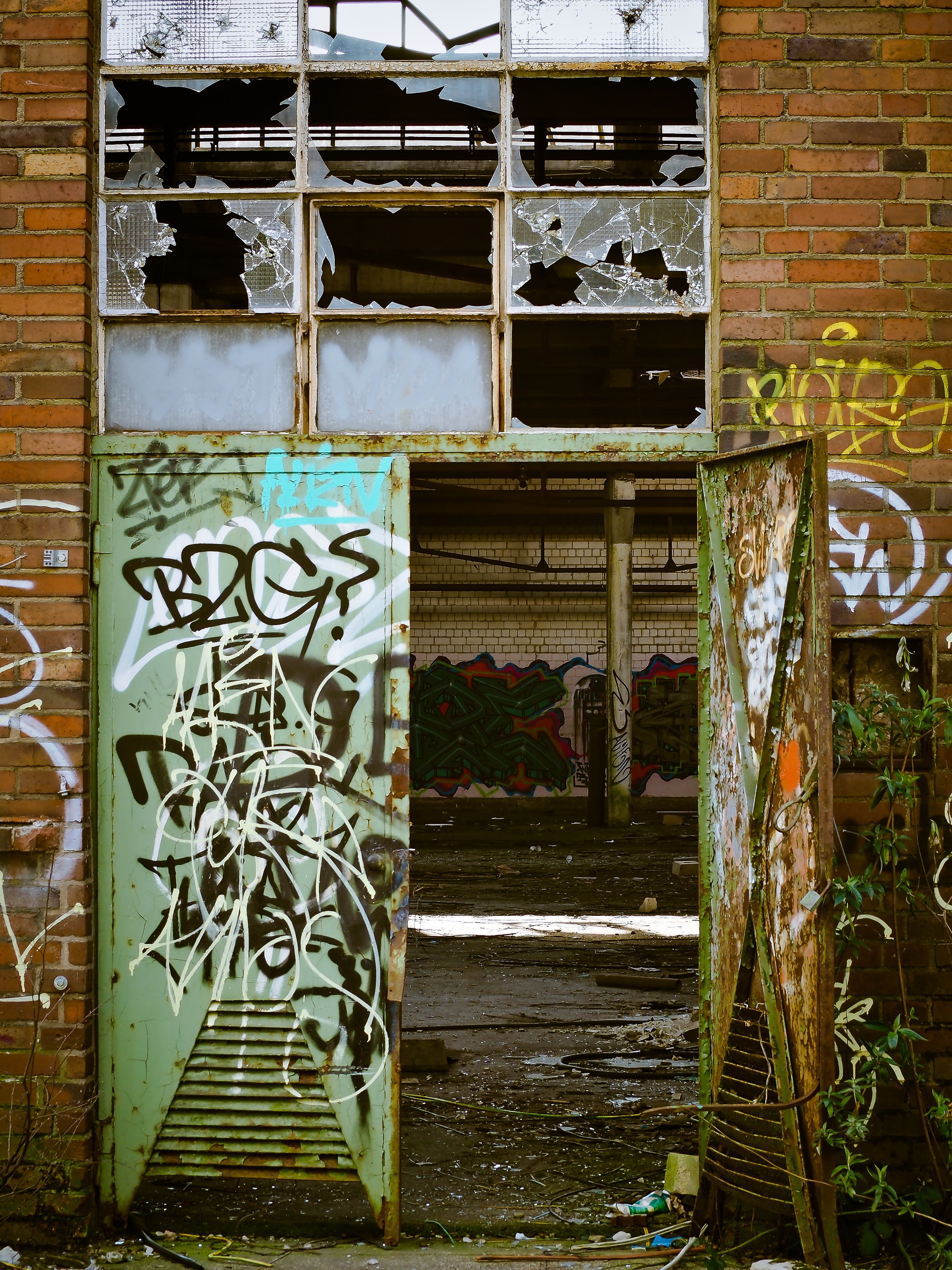 Council committed to tackling anti-social behaviour photo of building with broken windows and graffiti