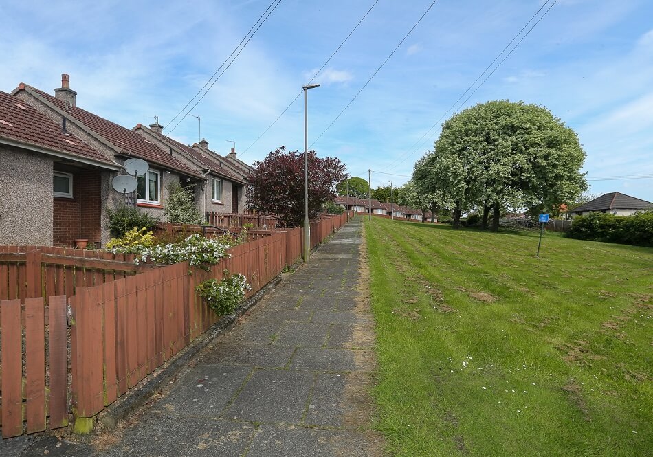 Exterior communal path leading to the bungalows at Elm Place
