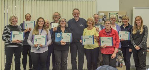Kelty Walkers holding up their certificates - Kelty Walks and Talks celebrates 3rd anniversary and launches new Walking Action Plan