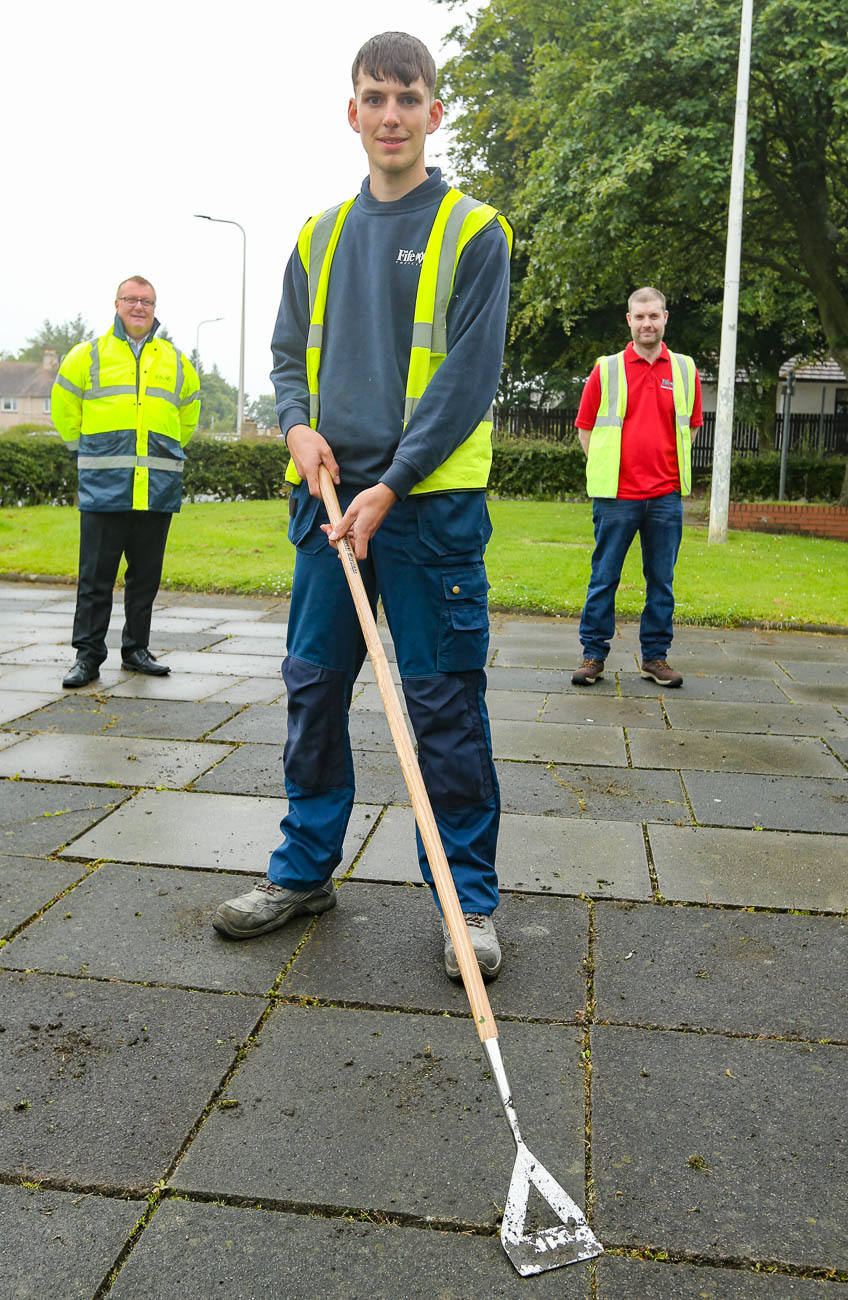 1st Year Apprentice Bricklayer Shon Flynn maintaining the local area in Woodside, Glenrothes. Pictured with previous apprentice Chargehand, Alastair Mclean and Apprentice Scheme Team Manager, Neil MacGregor Shon Flynn