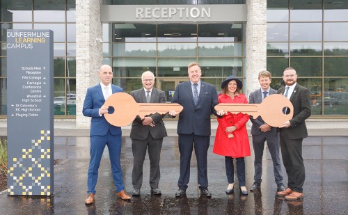 Bam Construction hading keys to councillors and council officers - Keys to the new schools at Dunfermline Learning Campus
