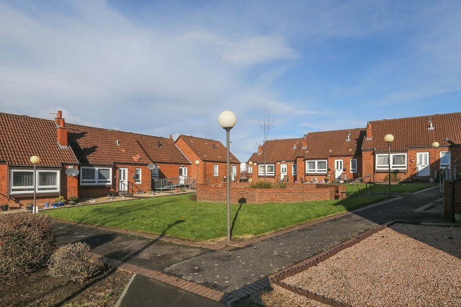 Outside communal area, in front of the bungalow properties at Ross Gardens