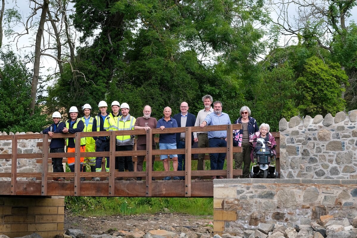 new Aberdour Harbour footbridge with people standing on it