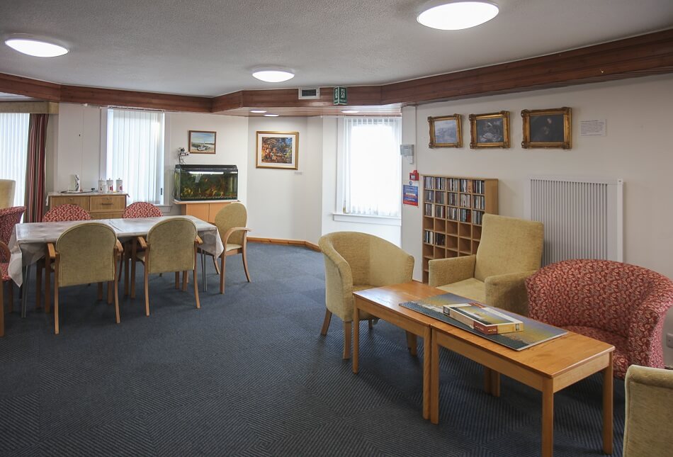 Communal dining and seating area at Harbourlea