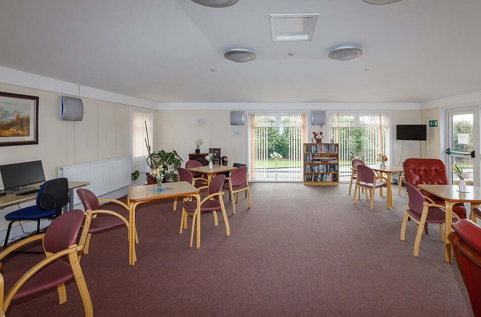 Seating area at Graham Court, with reading area