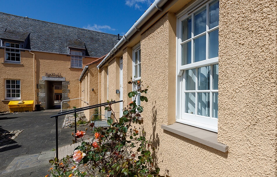Exterior of the gardens at Kirkhill, with shared walkway