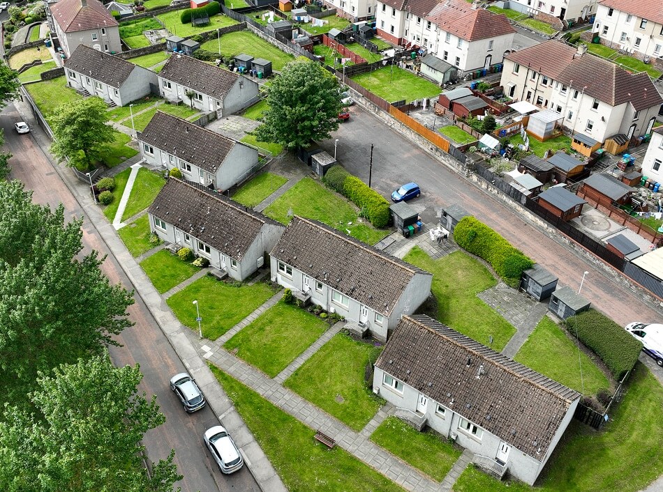 Aerial birds' eye view of the cottage-style properties at Edington Place