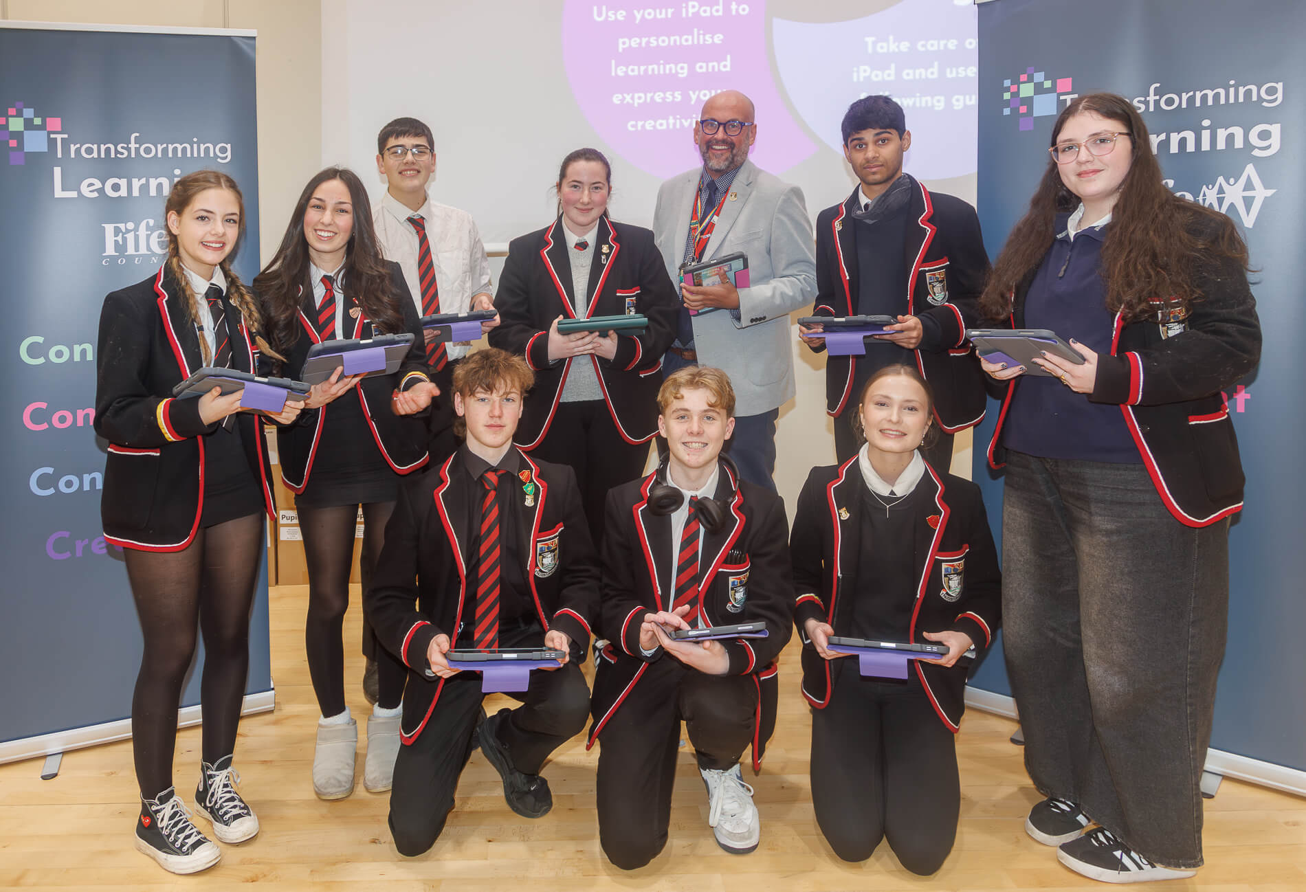 Pupils at Waid Academy receive their iPads