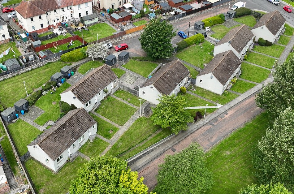Aerial birds' eye view of the cottage-style properties at Edington Place