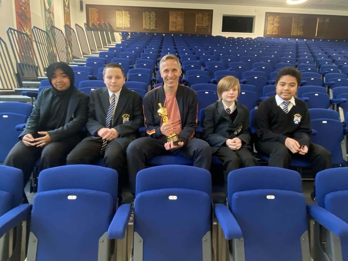 Oscar-winning sound engineer Chris Burdon with four students