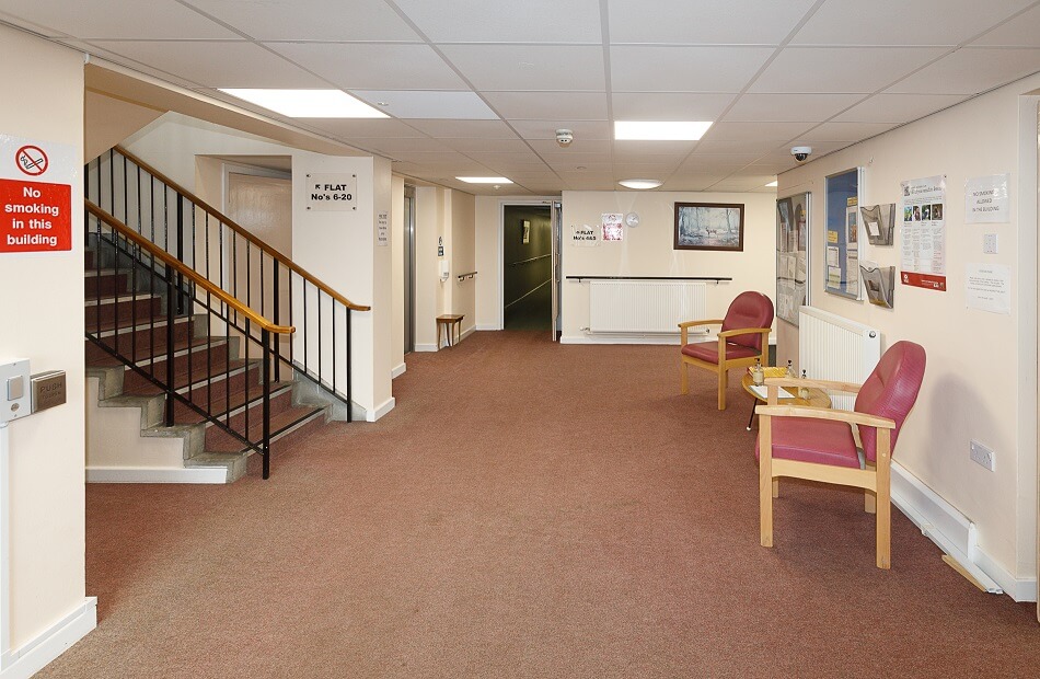 Hallway leading to a staircase at Graham Court