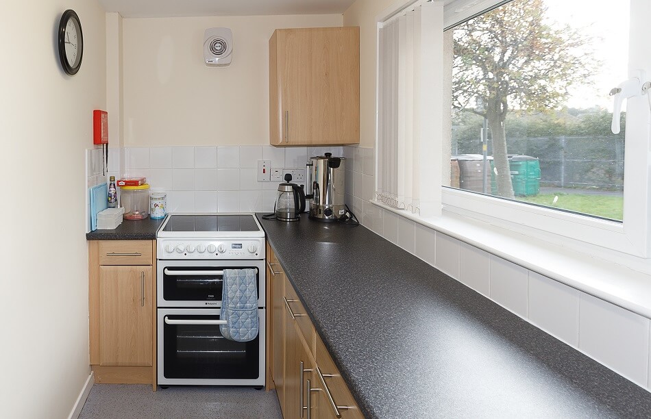 Communal kitchen at McFarlane Court, with view out into garden