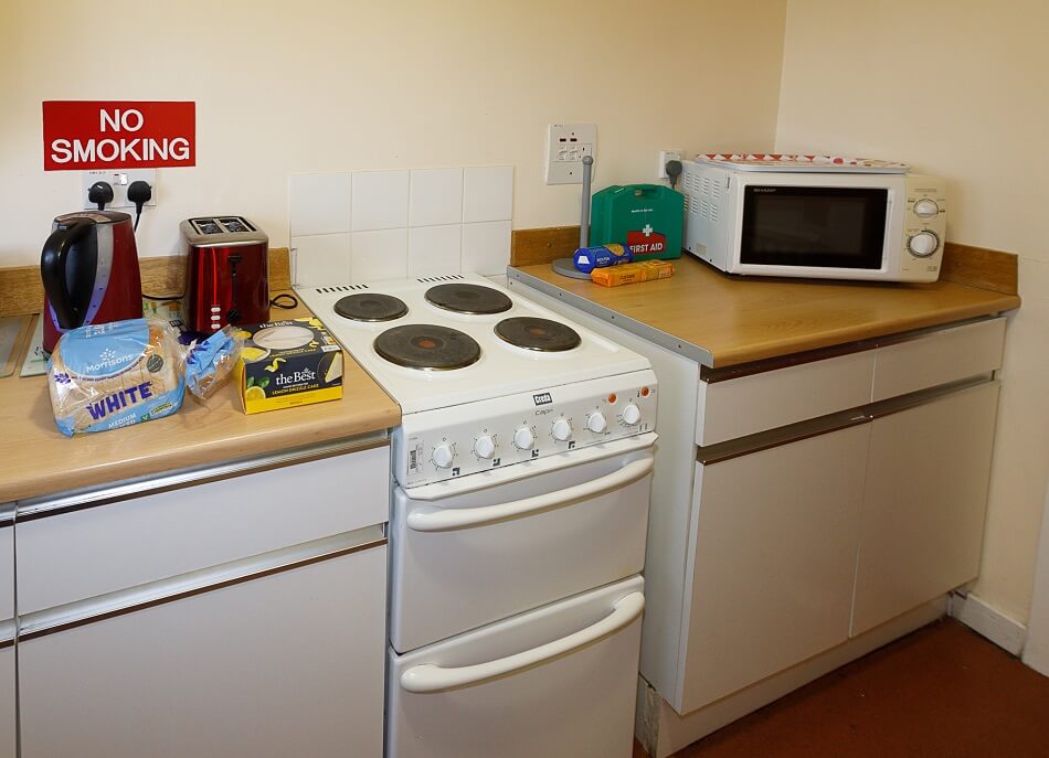 Communal kitchen area at Meldrum Court, with cooking and food prep area