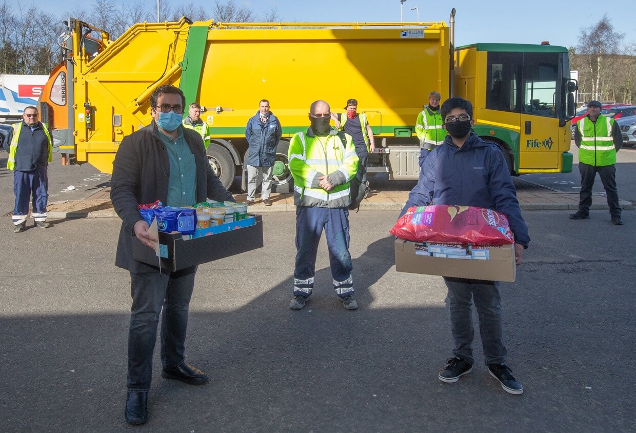 Ahmadiyya Muslim Community representatives delivering healthy snacks to the Dunfermline bin crew