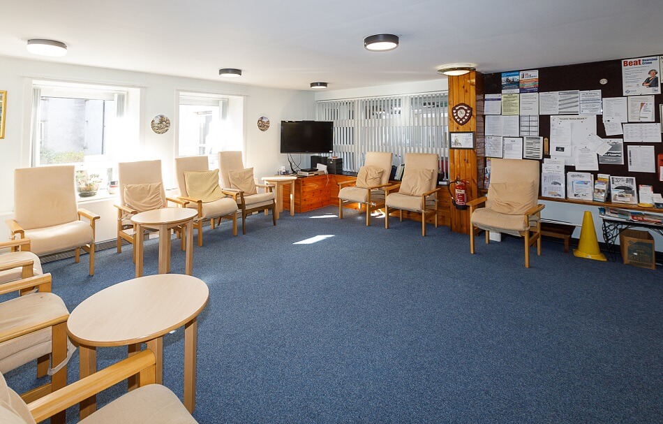 Communal seating area at Bathgate Court, with TV