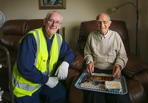 Alan Hunter, Meals on Wheels delivery driver with Mr Alex Monaghan from Kirkcaldy with his Meals on Wheels.