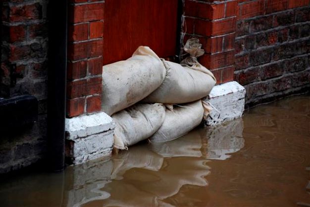 Sandbags in doorway - Council response to flooding 30 December