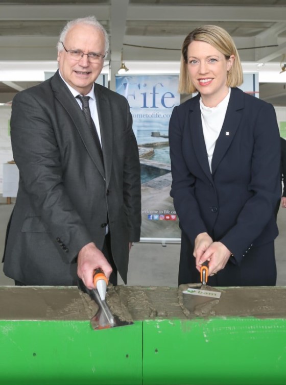 Cllr David Ross and Jenny Gilruth MSP lay cement plinth - Celebrations at Dunfermline Learning Campus