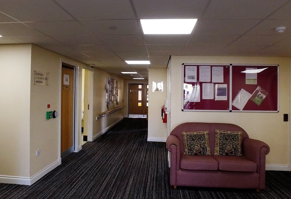 Lounge/waiting area at Byron Court, with sofa chair