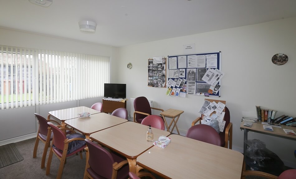 Communal dining area at Broomside, with tables and chairs