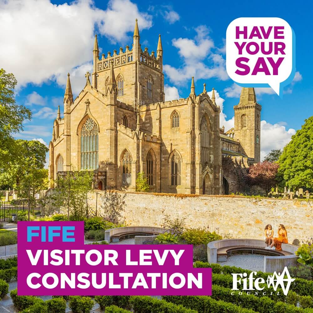 Dunfermline Abbey on a sunny day against a blue sky with white clouds - Consultation on a potential Visitor Levy in Fife to be extended