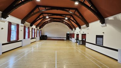 Bright space main hall with badminton court line on the floor