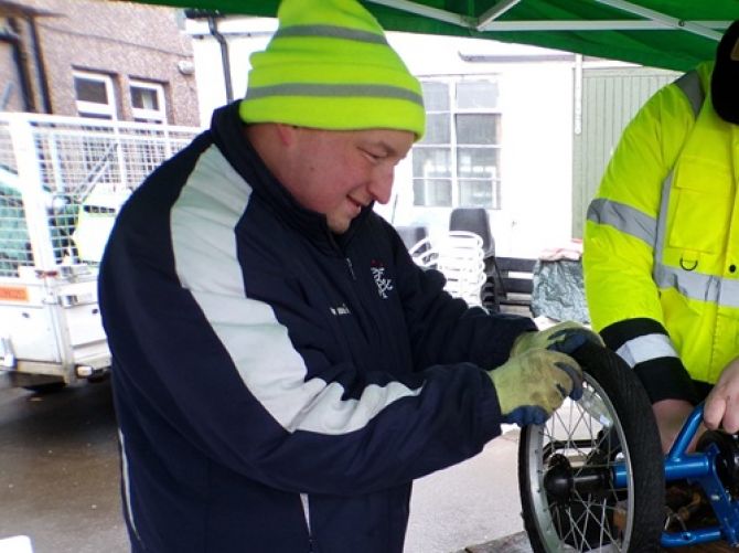 A previous CISA student repairing a tyre.