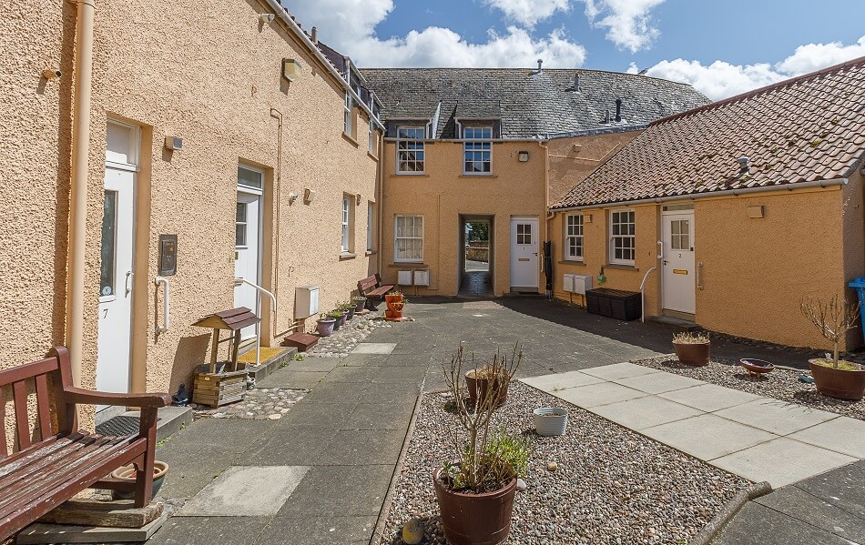 Exterior of the gardens at Kirkhill, forming a cul-de-sac