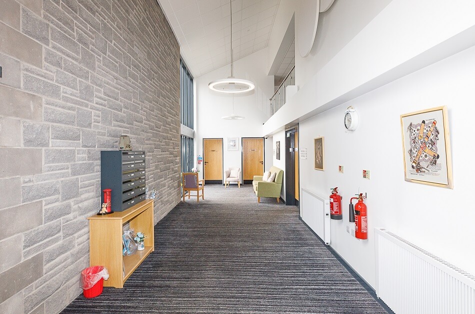 Spacious hallways at Den Court
