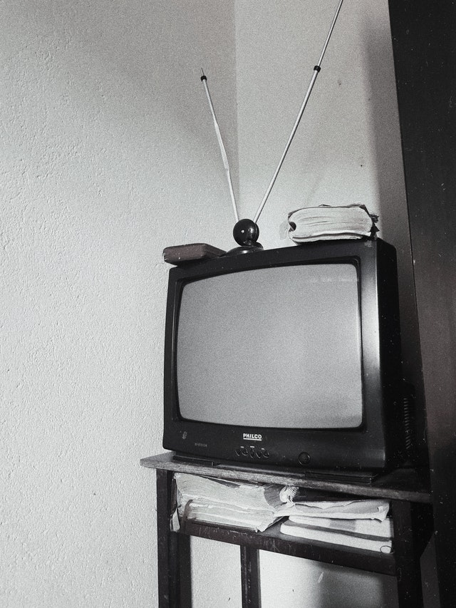 TV Licence Scams Warning Retro television with ariel