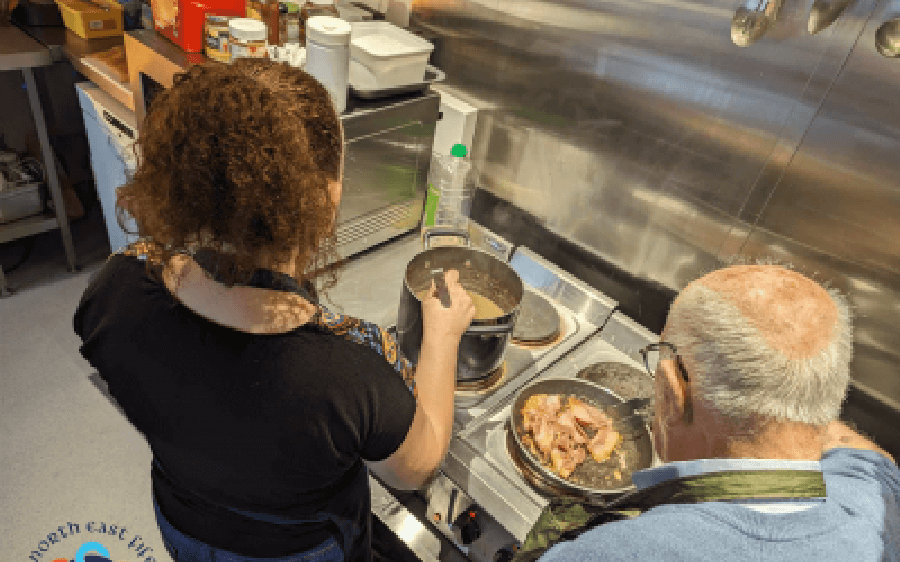 Volunteer chefs cooking in kitchen - Community Recovery Funding for North East Fife