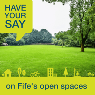 Green open space with trees and text: