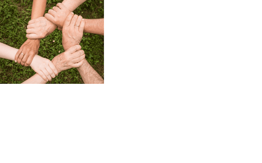 Hands holding wrists
