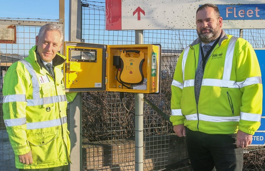 Roddy Sneddon (left) and Garry Hegg (right) With the new defibrillator. Roddy Sneddon (left) and Garry Hegg (right) With the new defibrillator.