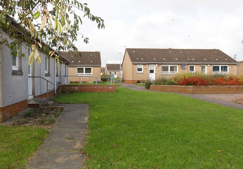 Front of the bungalows, with either step or ramp access