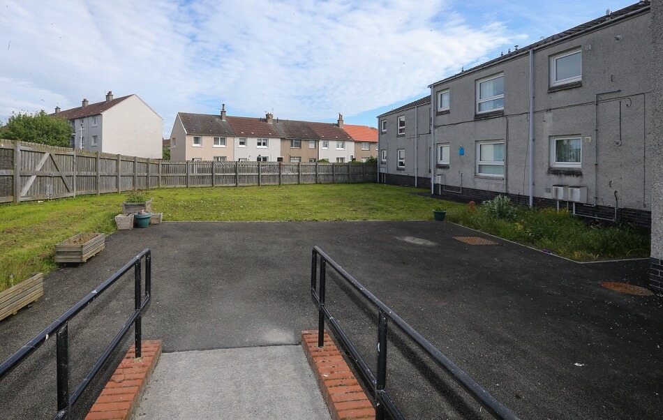 Ramp leading down to outside area at Lismore Place
