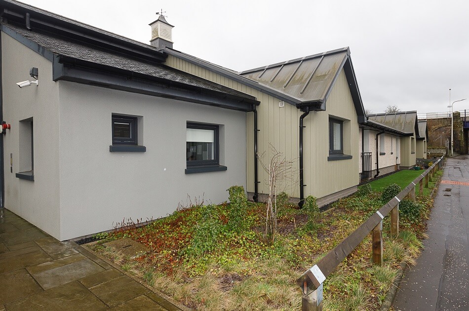 Exterior of the bungalows at Den Court
