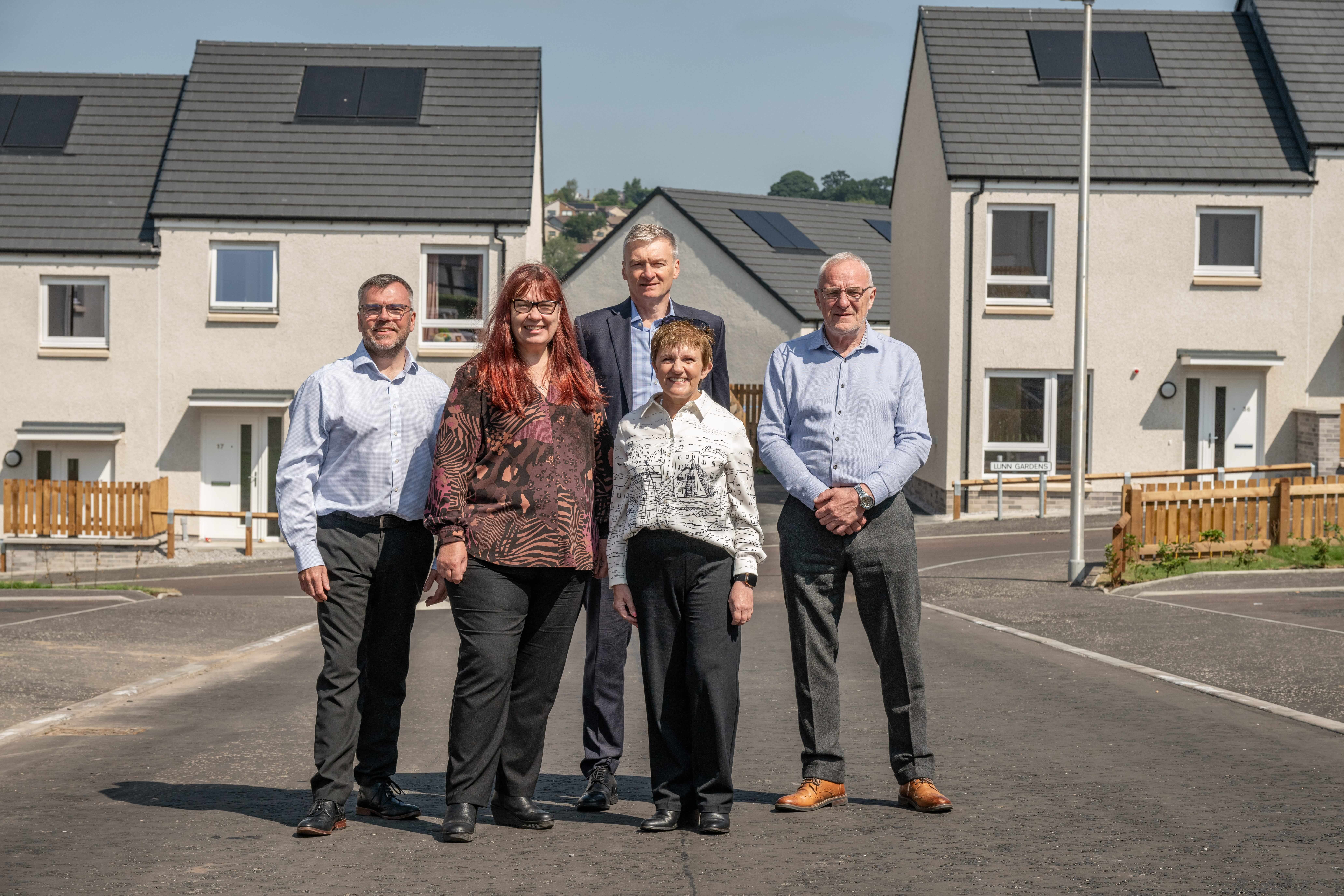 Our main photo shows (L–R): John Baggley, Managing Director, Robertson Partnership Homes; Susan Wilson, Commercial Director; Robertson Construction Eastern; Michael O’Gorman, Fife Council Estates Manager; Cllr Judy Hamilton, Fife Council’s Housing Spokesperson; and Graeme Lawtie, Operations Director, Robertson Construction Eastern.