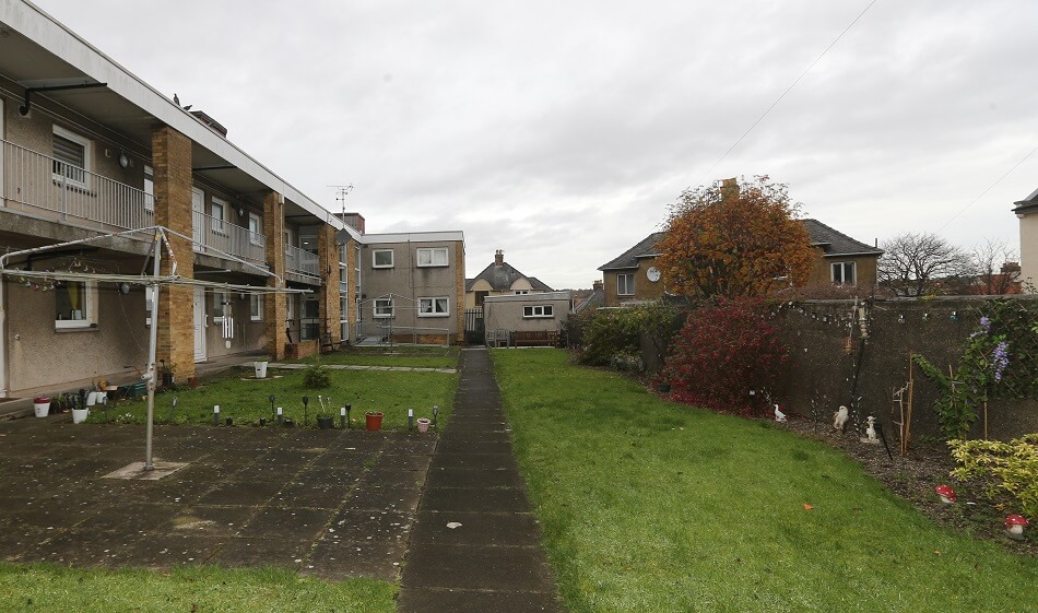 Communal garden at Patterson Place, with rotary drier