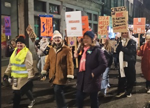 16 Days of activism - Reclaim the night march Group of women walking at night with placards