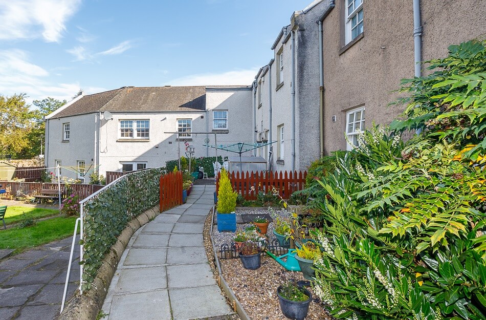 Communal walkways and gardens at the rear of Winthank Court
