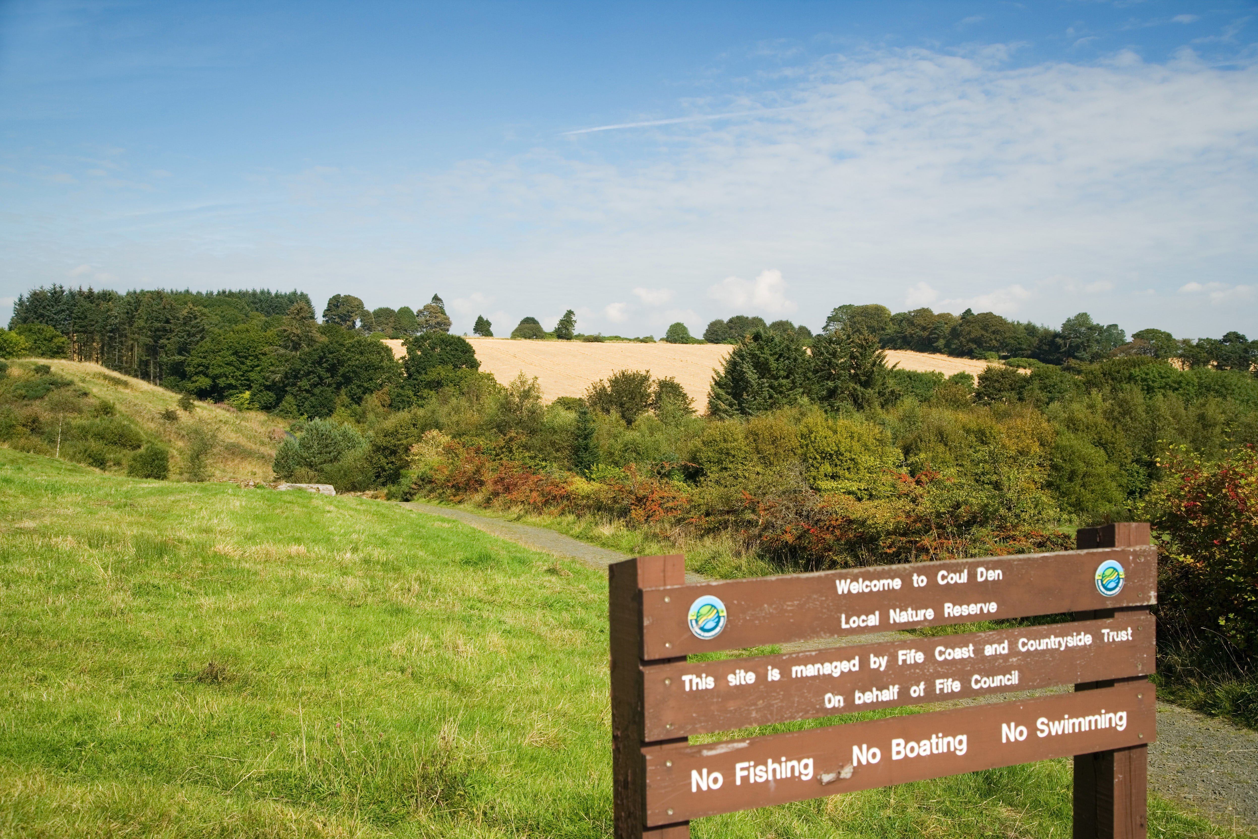 Picture of sign welcoming people to the Coul Den park