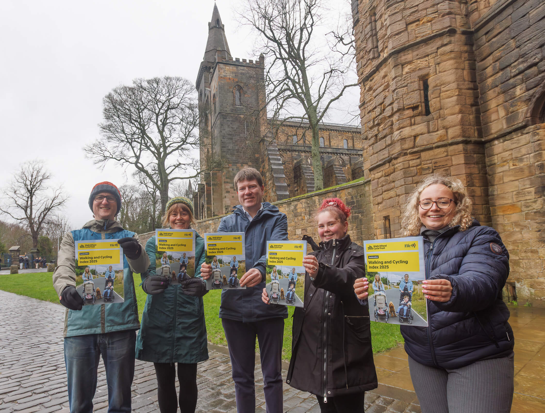 Group pic in front of Abbey (left to right) - James Butson, owner of Pedals Bike Care Fife; Amy Hickman, Physical Activity Co-ordinator at Fife Council; Councillor James Calder, City of Dunfermline Area Committee Convener; Holly Hunter, Active Travel Senior Project Officer at Fife Council; Lucy Jackson, Transportation Officer - Sustainable Transport and Parking at Fife Council.