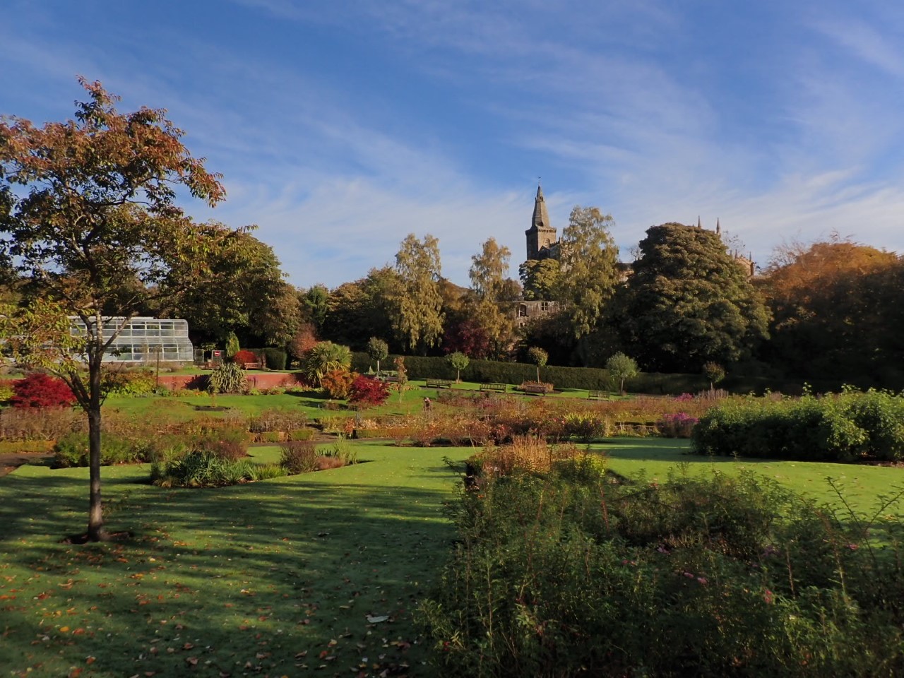 Planting within the formal garden, looking to the abbey in the background