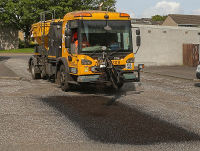 Fife Council's velocity patcher being used to repair roads