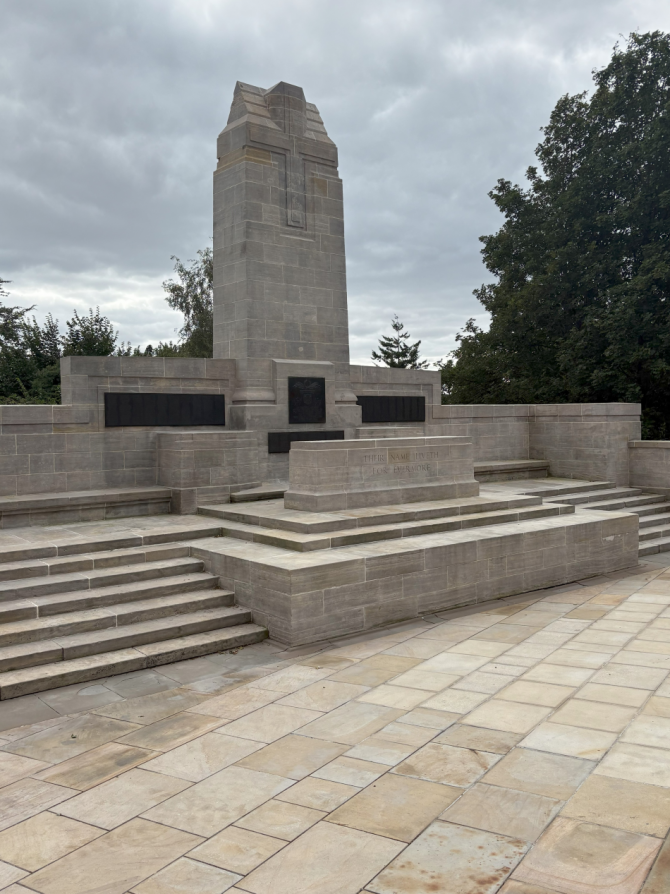 Photo shows the steps and the World War I memorial 